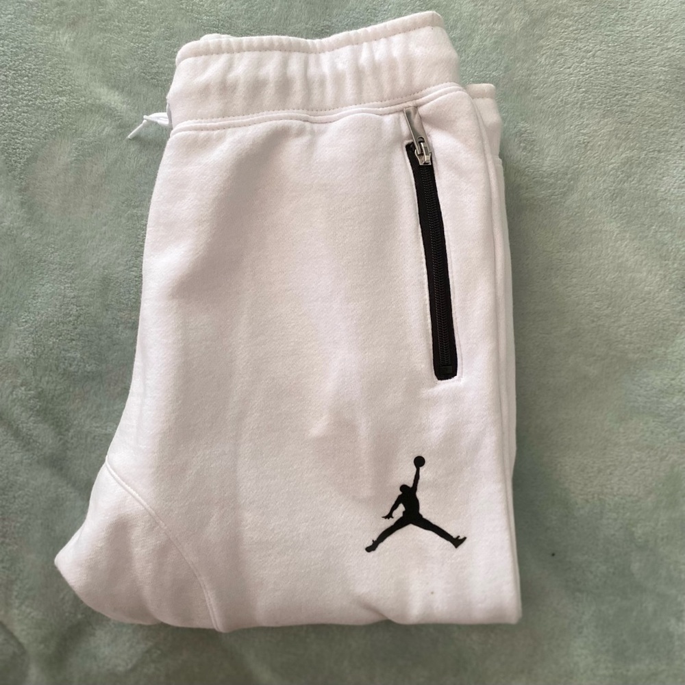 White Jordan joggers, size large in youth 12-13 yr